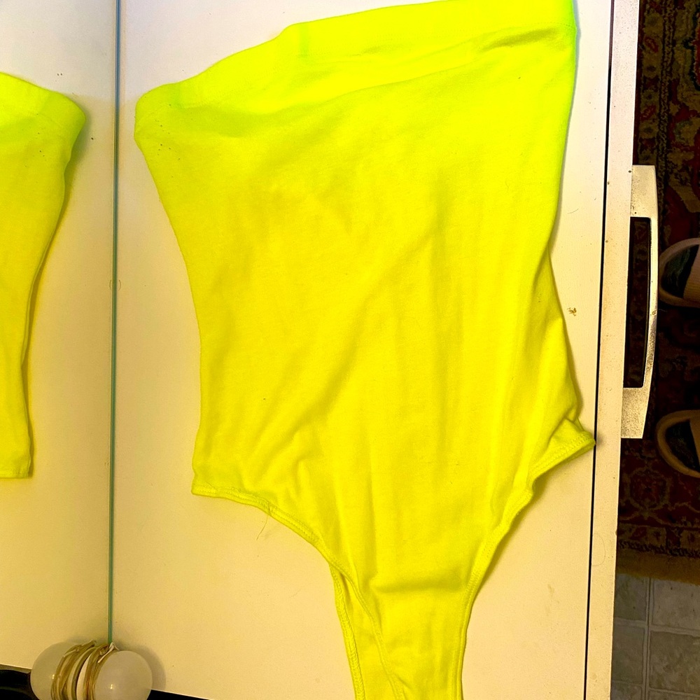 Neon yellow strapless body suit